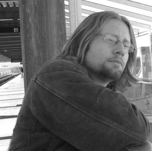 Black and white photo of Adrian Sandoval.